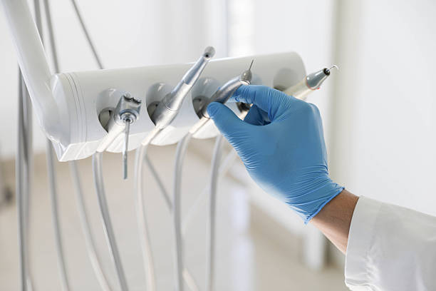 Professional Tooth Extraction technician working in Fairfax Station, VA